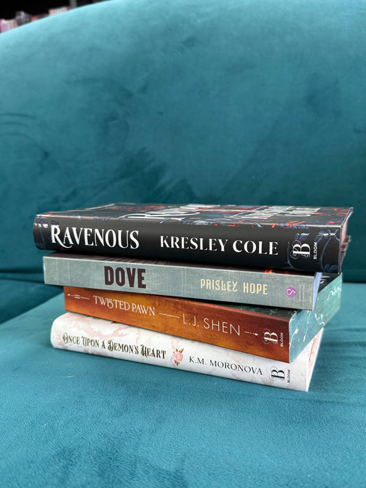 Dark romance book stack featuring Twisted Pawn, Fallen Rook, King of Gluttony, Ravenous, Once Upon a Demon’s Heart, Dove, Foxx, and Fury Bound.